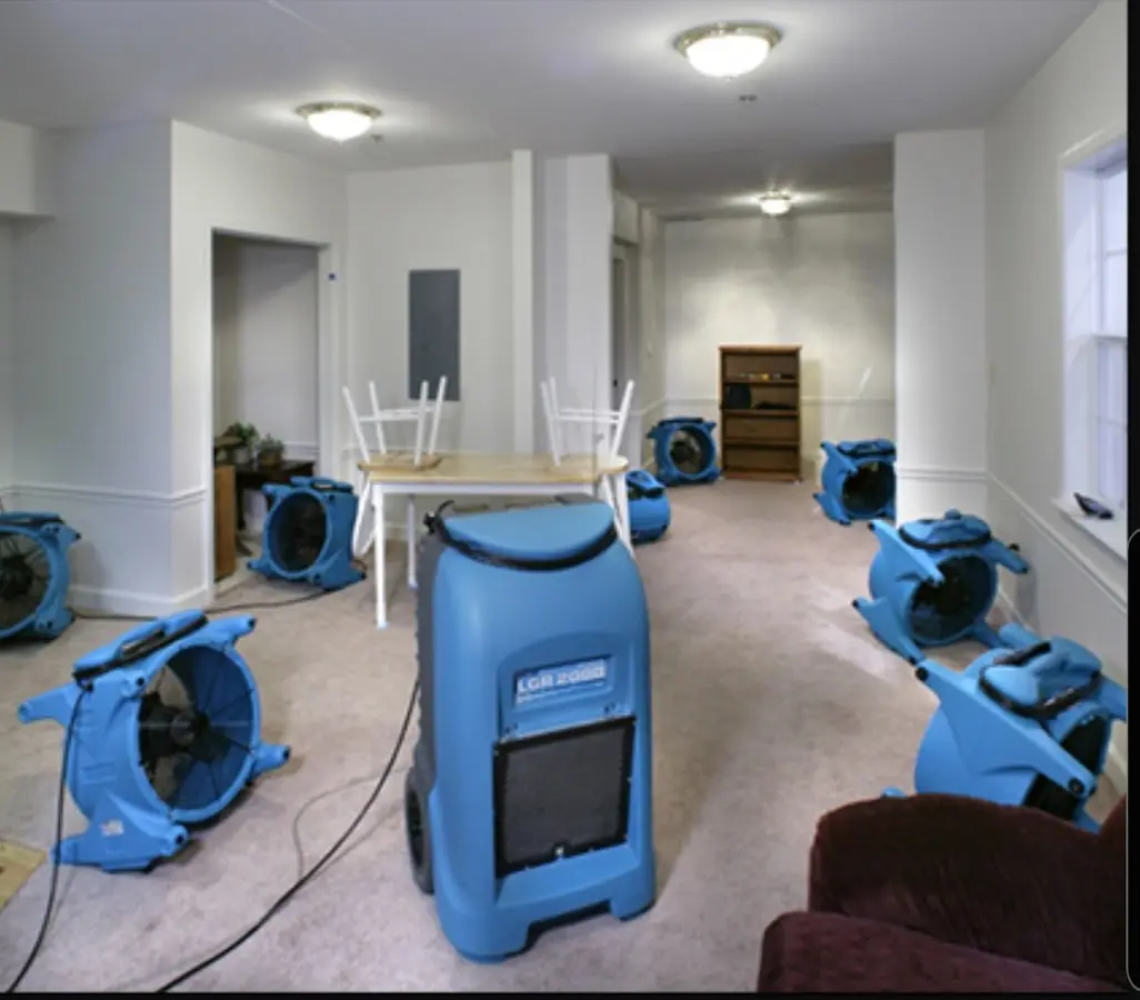 Air movers and dehumidifier setup for Water Extraction & Removal in Baker